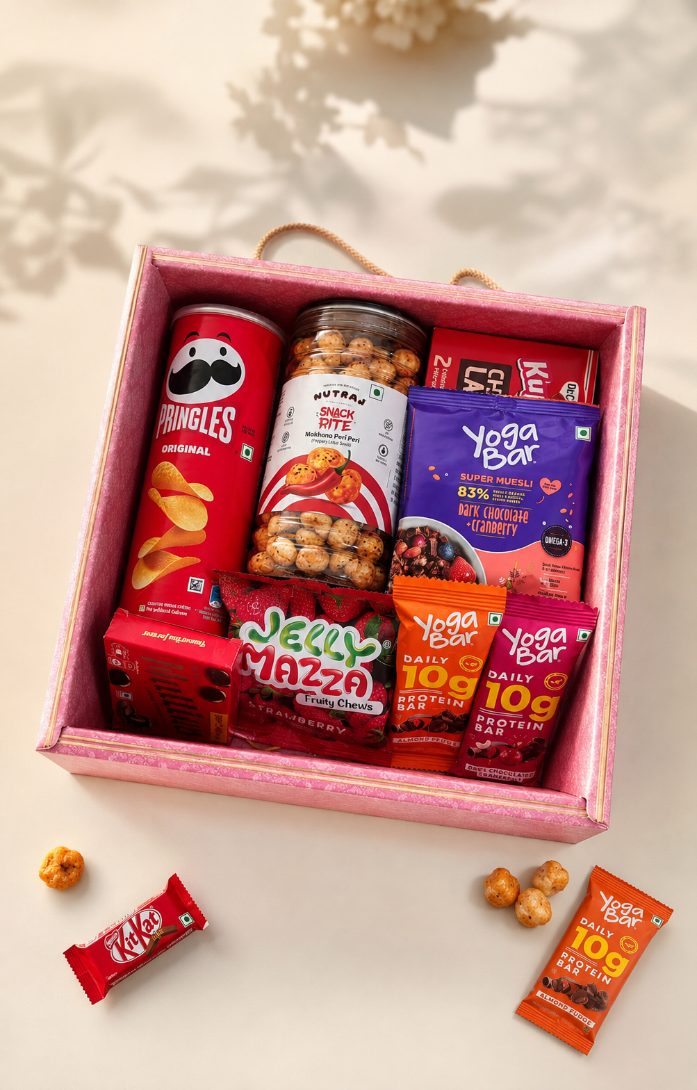 Snack gift hamper box with Pringles, Yoga Bar, makhana, Choco Lava and chocolates