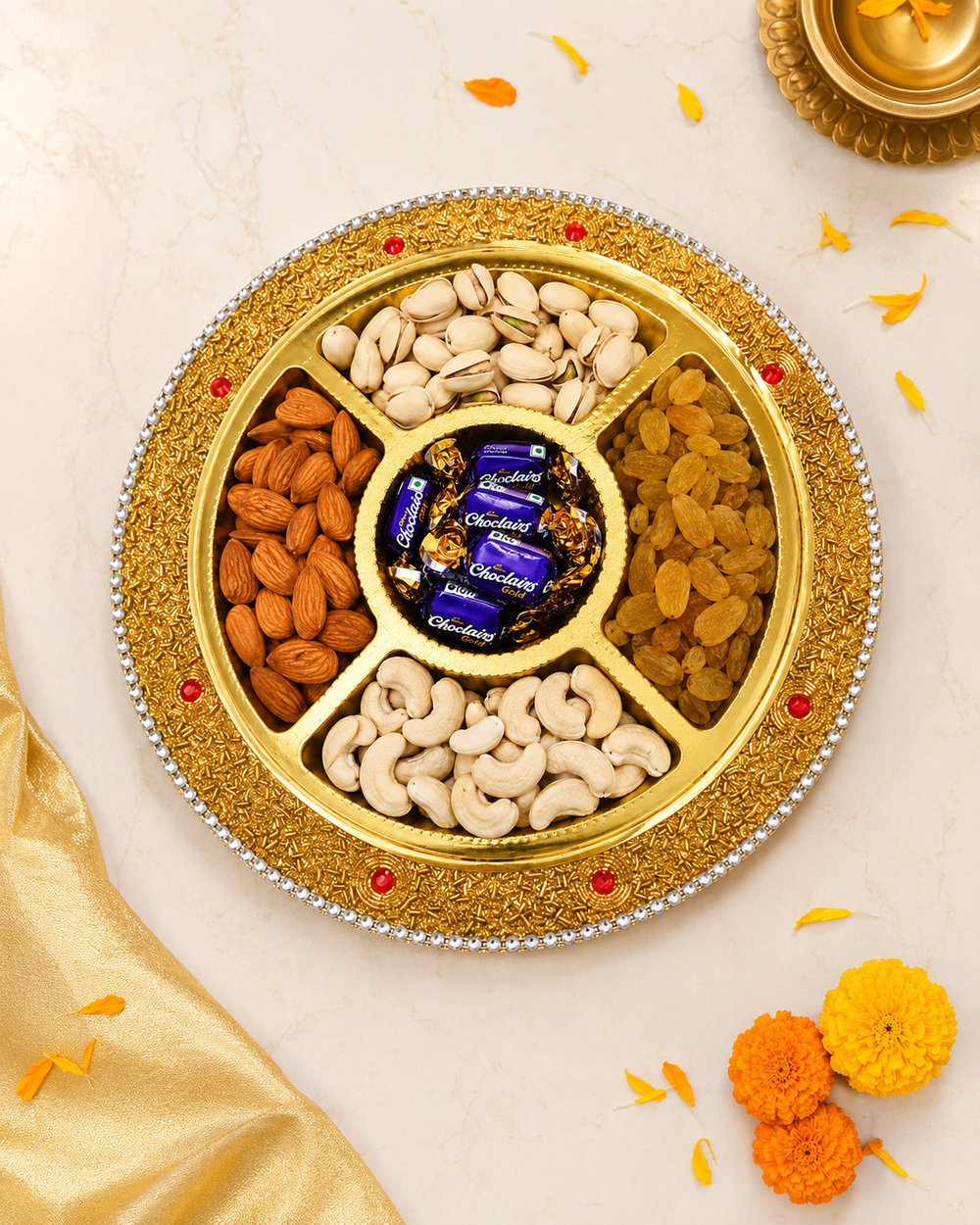 Dry fruit gift tray contents – almonds, cashews, pistachios, raisins and Choclairs chocolates