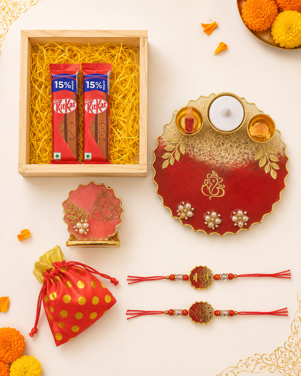 Rakhi gift hamper contents – 2 resin rakhis, pooja thali, roli chawal, almonds and KitKat