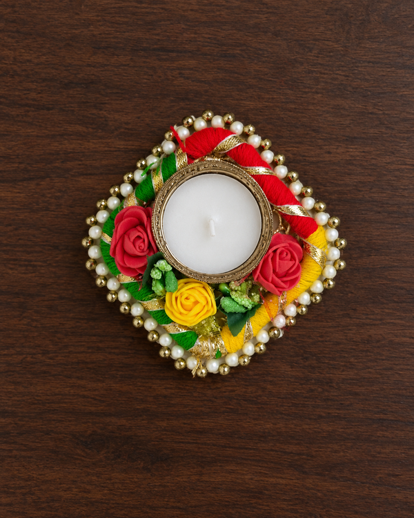 Rose Garland Tealight Diya with red and yellow roses, pearls, gold beads and red, green and yellow thread – Giftra